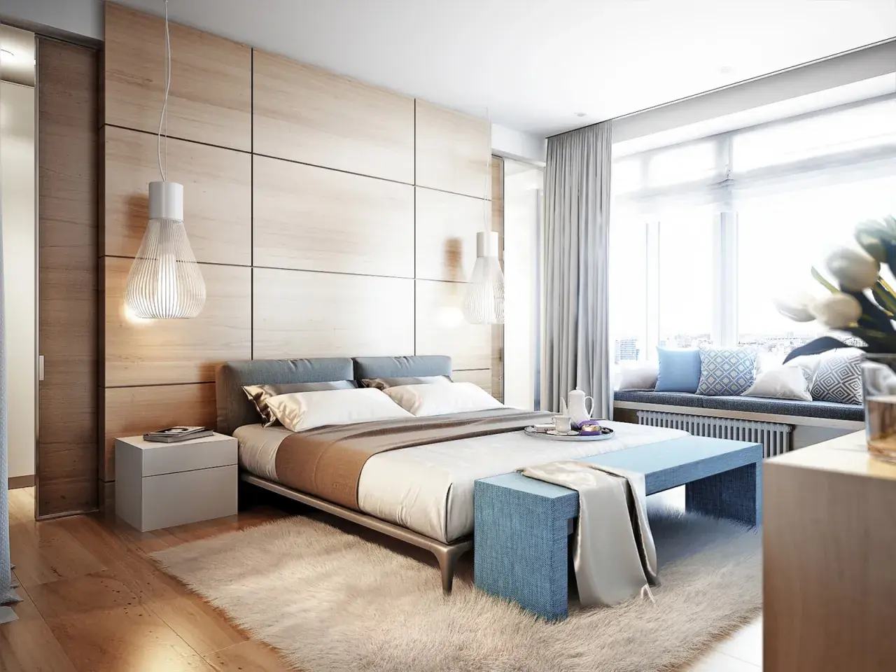 Camera da letto moderna con testiera in legno, letti comodi e un angolo relax vicino alla finestra, come nei comuni di Ischia.